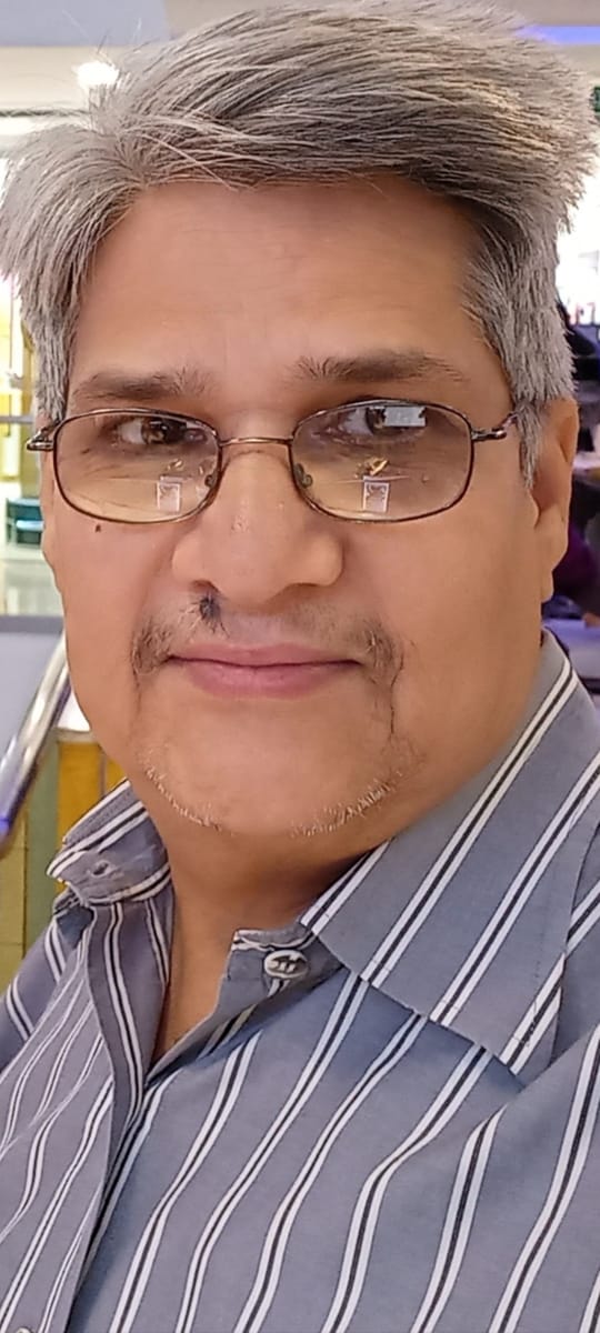 Retired District Judge Sanjay